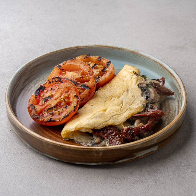 Sundried Tomato, Mozzarella and Basil Stuffed omelette  With Grilled Tomato